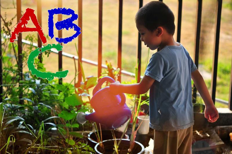 Image of child in a garden. Image of child in a garden.