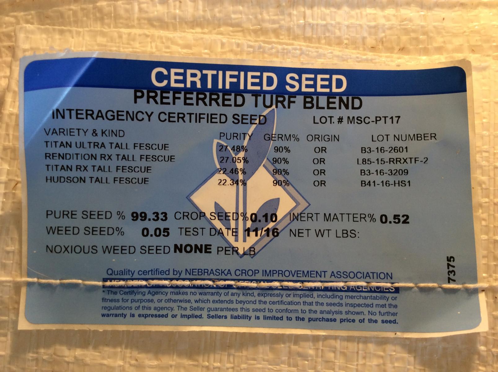 Picture of blue tag labeled grass seed.