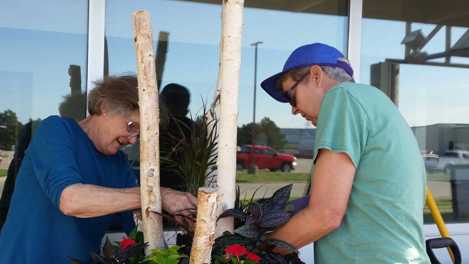 image of master gardeners working on planters