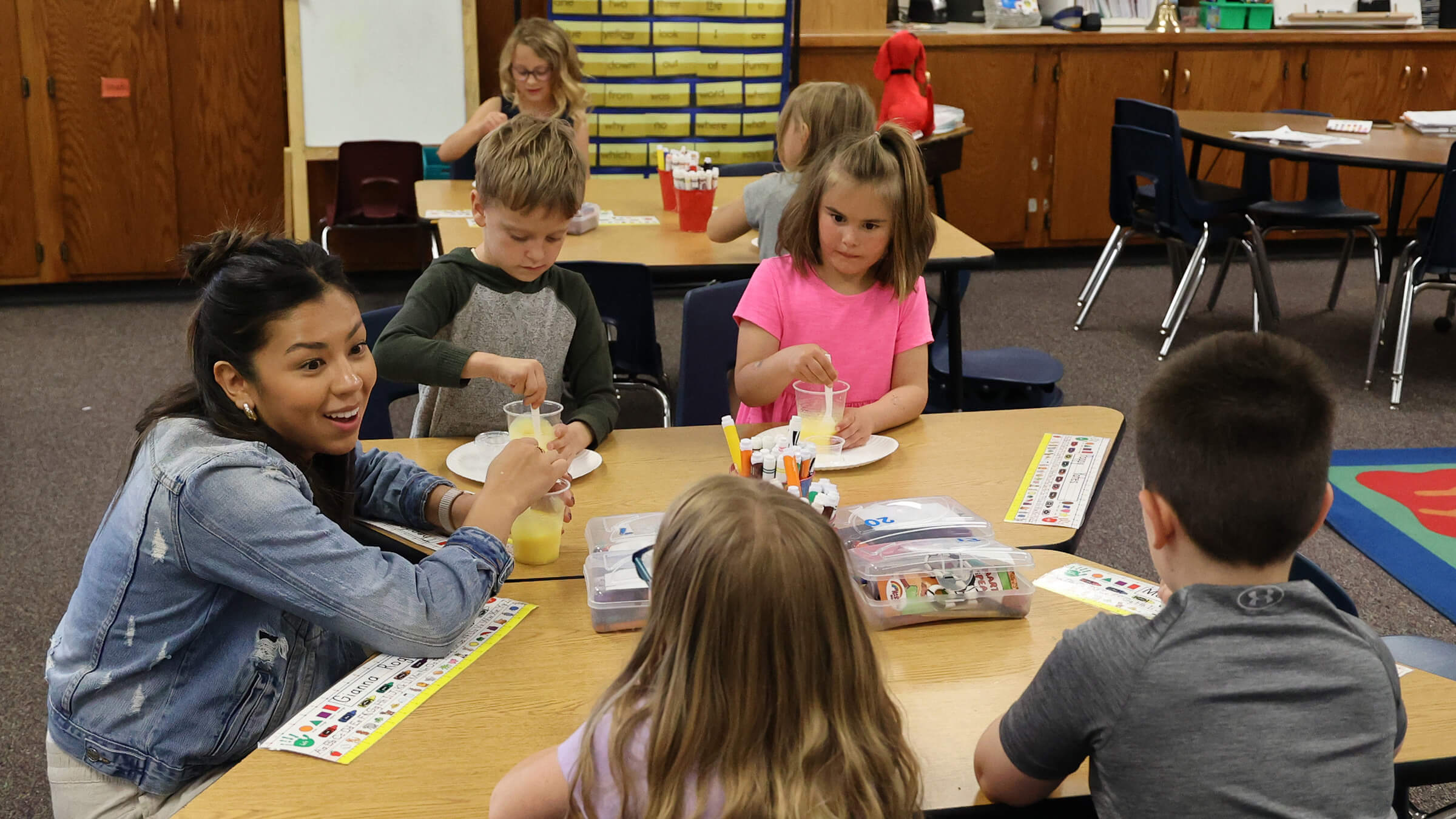 Photo of Sam Isaacson teaching about pudding in the classroom