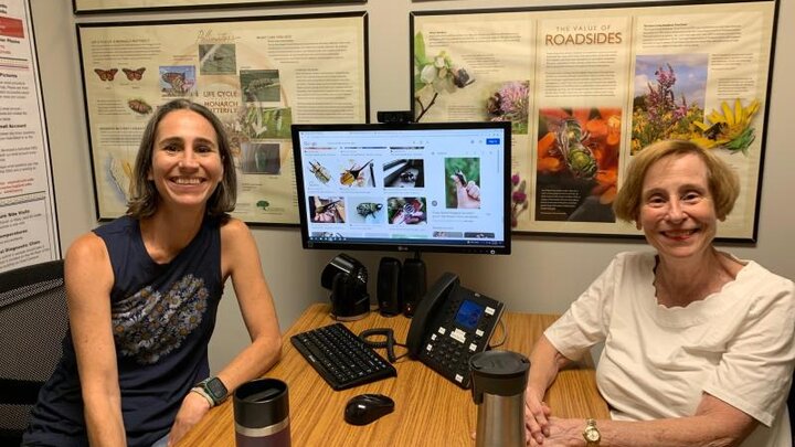 Picture of Master Gardeners answering client phone questions.  